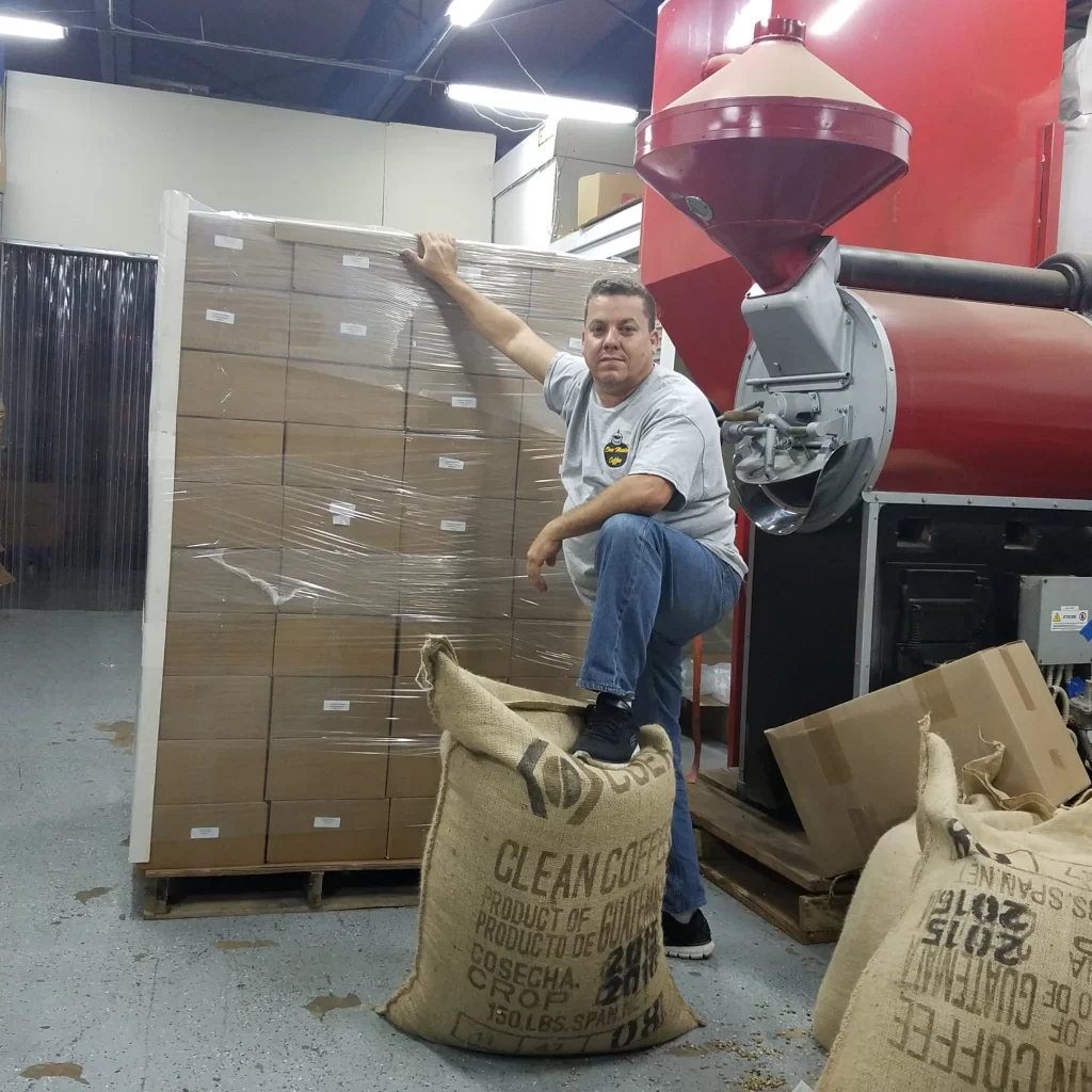 Lazaro at the drum roaster in Hialeah